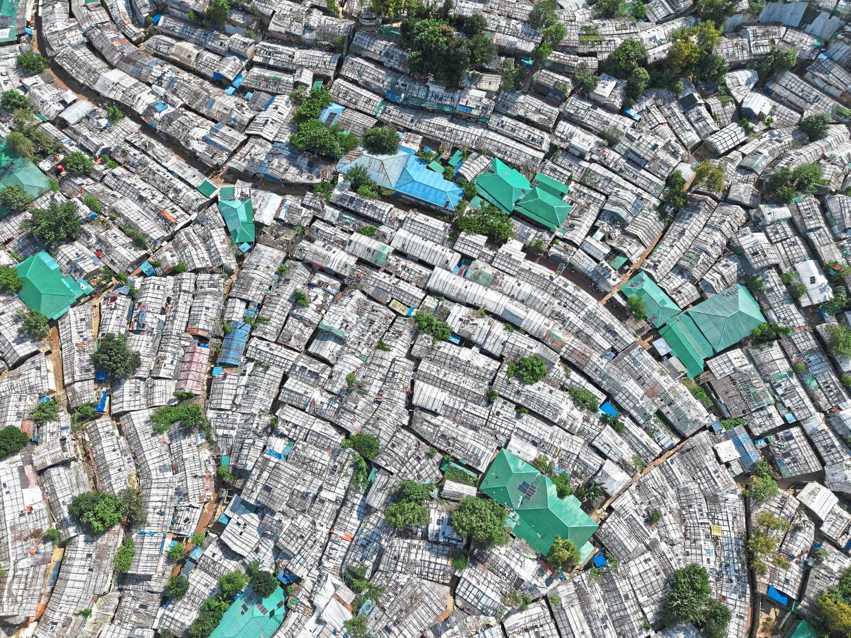Cramped living: An aerial view showing Rohingya refugees’ Balukhali camp in Ukhia. Bangladesh now hosts 1.3 million forcibly-displaced Rohingya from Myanmar and it the ‘largest refugee camp in the world’. — AFP