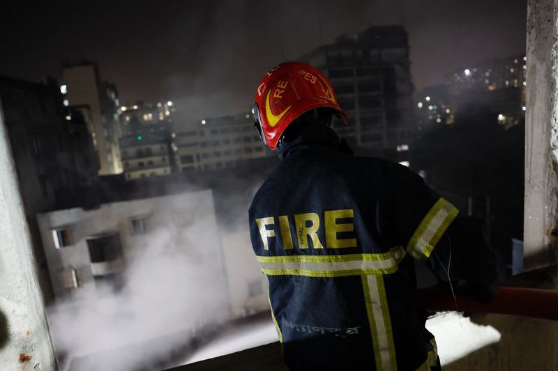 Bangladesh official blames locked door, toxic gas for deaths in factory fire