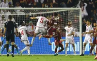 Soccer-Qatar book World Cup slot as second-half headers sink UAE