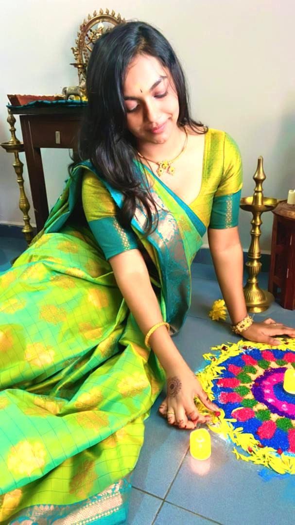 Maithilli is dcorating her home kolam for the Deepavali celebration. --PHOTO COURTESY OF MAITHILLI.