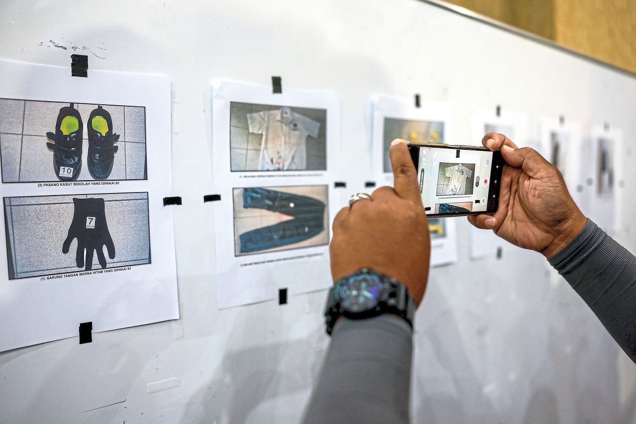 Grim evidence: Photos showing weapons and other items taken by the police from the Bandar Utama school fatal stabbing scene. — Bernama, IZZRAFIQ ALIAS/The Star