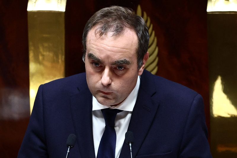 French PM faces day of reckoning, but likely to survive no-confidence votes