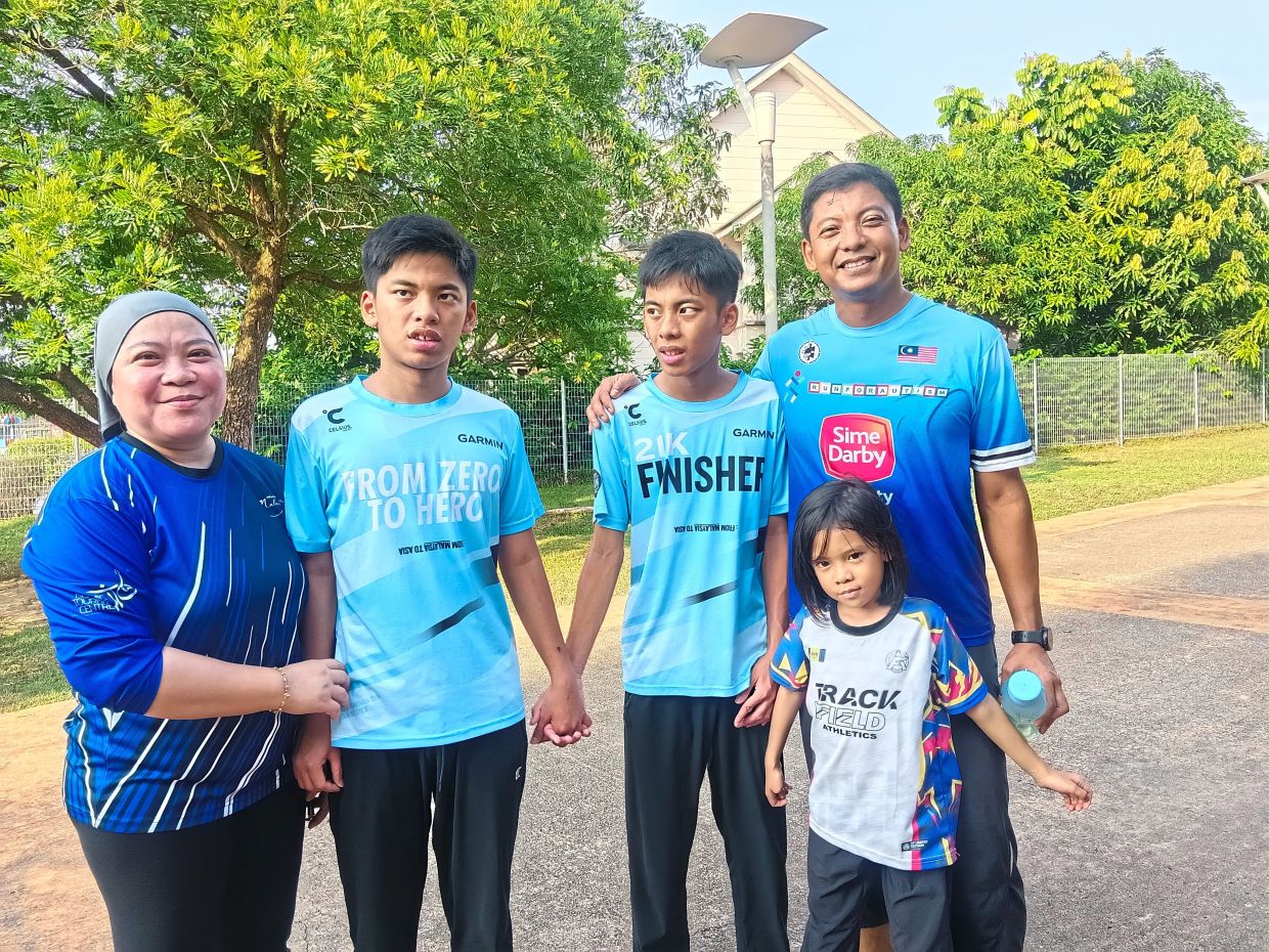 (From left) Nur Alyssa, Ryan Asyraff, Ryan Aimar, Raswanizam and seven-year-old Rose Asyiefa at Precinct 18 parkrun. Nur Alyssa says the Precinct 18 parkrun has become a family activity.