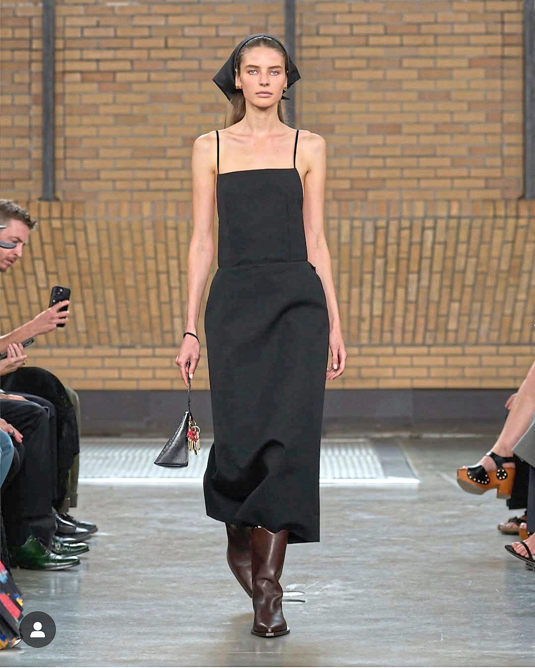 A black dress with clean lines, a 1990s throwback that feels effortless, versatile and wearable today. Photo: Instagram/Calvin Klein