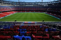 Soccer-Barcelona extend Spotify partnership for shirts and stadium naming rights