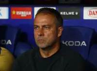 Soccer-Barca's Flick rejects reports of interference in team selections