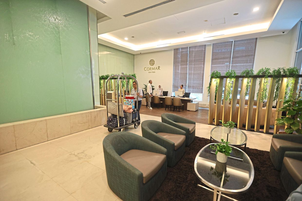 Guests are greeted in the lobby with thoughtful touches like cold towels and refreshments.