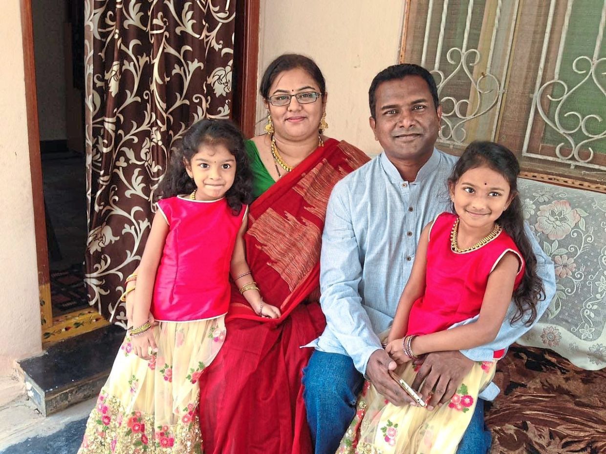 (From second left) Dr Umadevi, Pavan with their daughter Diyara (left) and niece Kritha during a previous Deepavali visit to India.