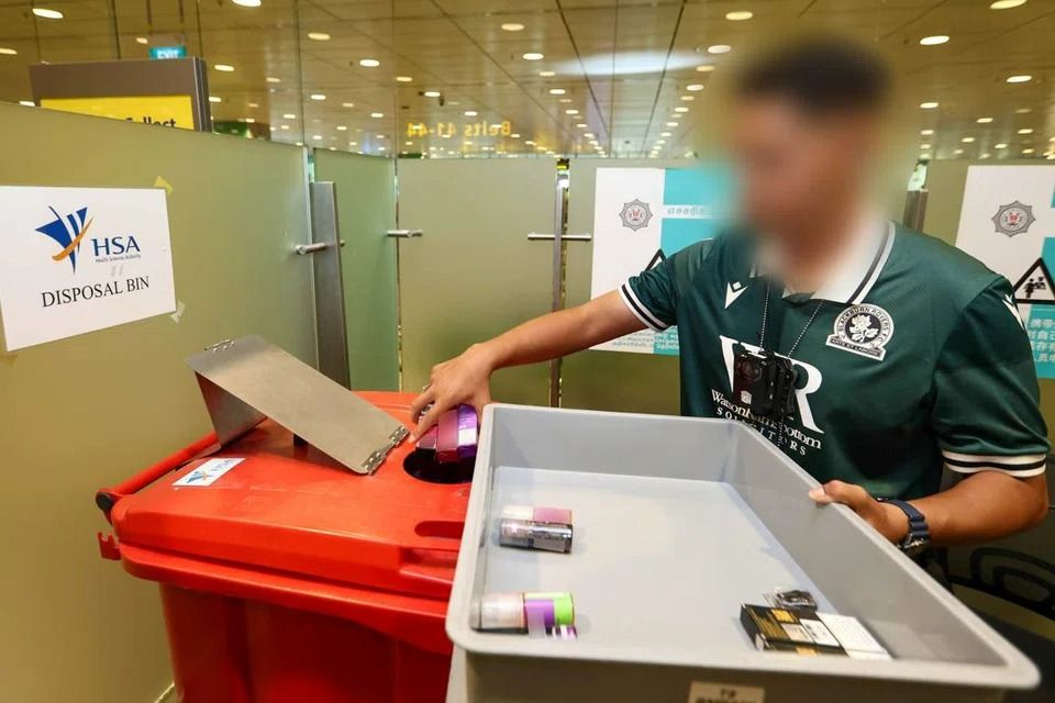 Fourteen others were separately caught possessing e-vaporisers, with a total of 395 devices and their related components seized. - Photo: Immigration and Checkpoints Authority
