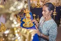 Keeping lamps polished, clean for festival’s radiant blessings