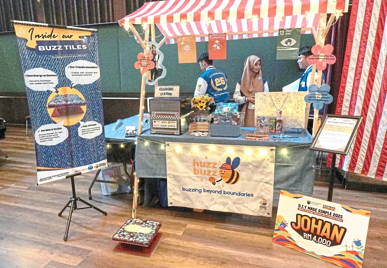 Winning idea: A booth showcasing the Huzz Buzz eco-tiles that turn footsteps into electricity.