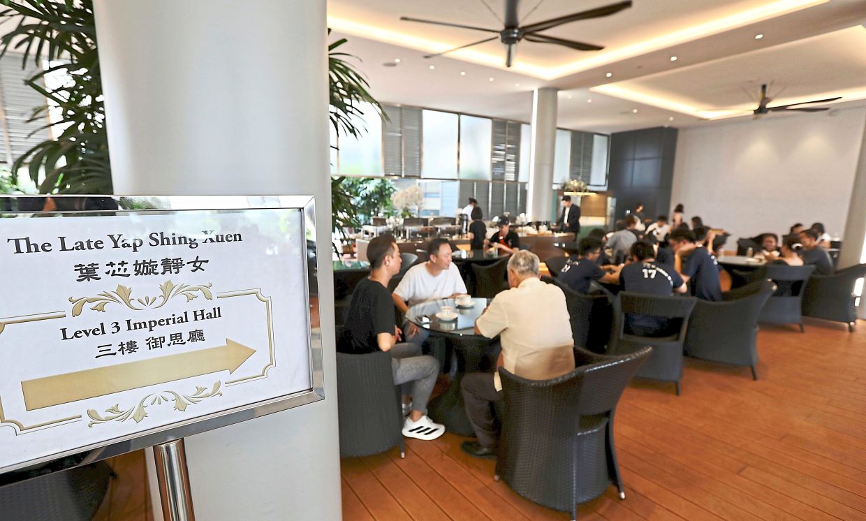 Painful loss: Mourners gathering at the memorial hall during Shing Xuen’s wake in Kuala Lumpur. — LOW LAY PHON/The Star