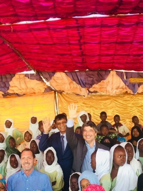 Selva (centre, in suit) during a rural community development event in Sudan in November 2018. He says his experience in the African nation is his most fulfilling at the UNDP.