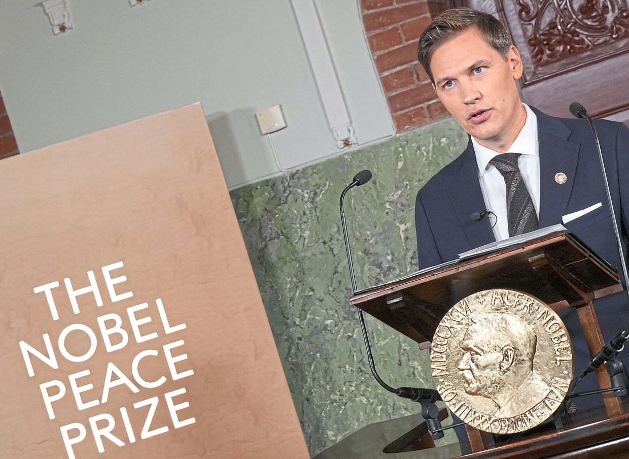 Chairman of the Nobel Committee, Jorgen Watne Frydnes announcing the winner of the 2025 Nobel Peace Prize on Oct 10. — Reuters