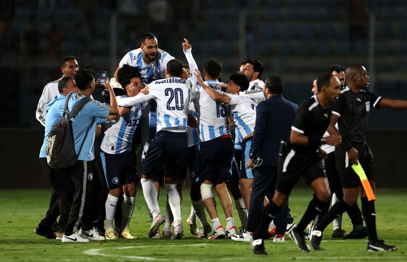 Soccer-Pyramids score late to win African Super Cup