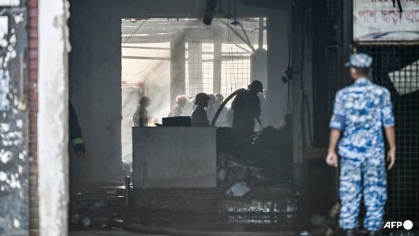 Firefighters douse fire at the cargo terminal of Hazrat Shahjalal International Airport, a day after the blaze in Dhaka on Oct 19, 2025. - Photo: AFP