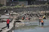 Floods a reckoning for Bali on overdevelopment, waste management
