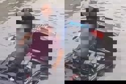 Man in China jumps into river, smashes car sunroof to rescue trapped driver