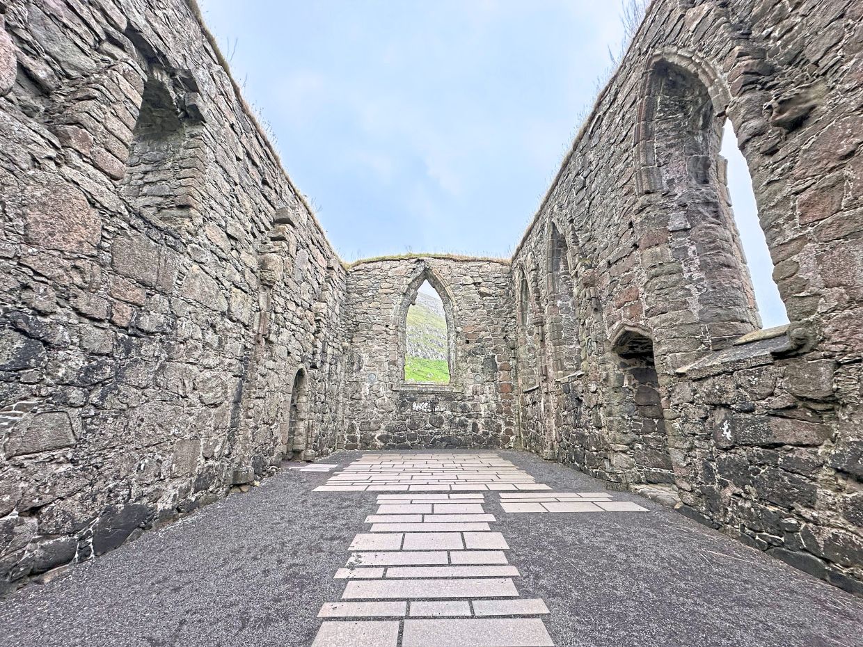 The ruins of an ancient Catholic church stand in Kirkjubour.