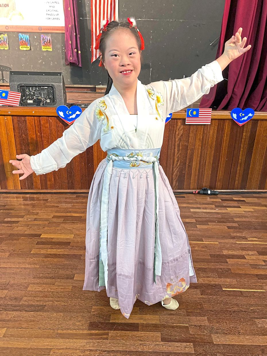 Megann Tan Rui Xin, 13, will be performing a traditional dance at Let’s Celebrate DS Awareness Month, organised by Alumni Kiwanis Down Syndrome Foundation. Photo: Elaine Lee