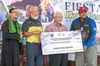 Invasive fish catcher gets an encounter of the croc kind