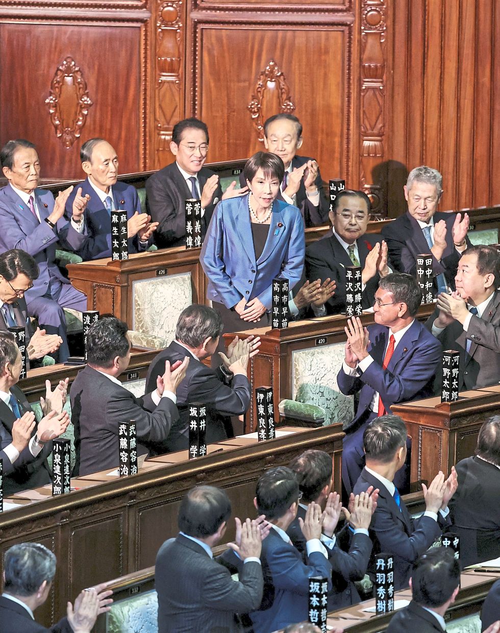 Breaking barriers: Takaichi reacting to applause after being elected prime minister at the Lower House of Parliament in Tokyo. — Reuters