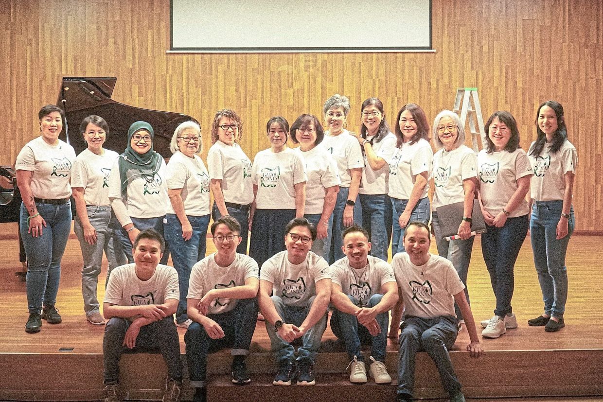 The presence of seniors in the intergenerational choir adds ‘wisdom, life stories, and a deep emotional connection to the songs’, says Goh (standing, far left). — Photos: DARWISH SYAHMI