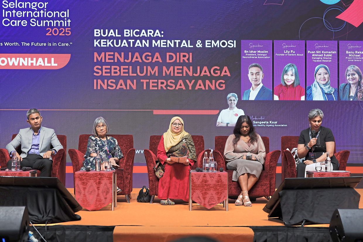 The columnist (second from left) took part in the recent Care Summit at KLCC which brought focus not only on eldercare, but also care for special needs children. — LILY FU