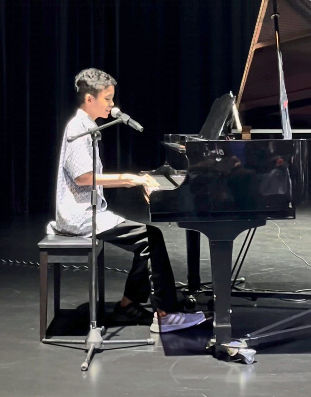 Raees, a self-taught pianist with autism, will perform at the concert. Photo: Instagram/Irin-Putri