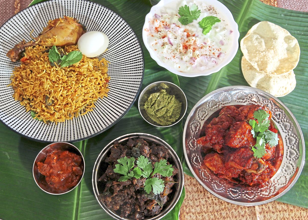 A complete Indian meal often includes a yoghurt-based dish to balance out the heavier or spicier dishes. — Filepic
