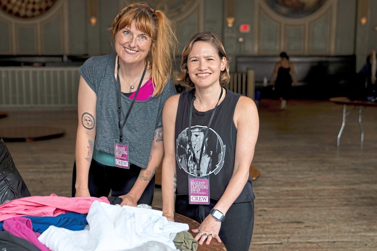 Ridgway (left) and Mollo during a clothing swap in Portland.