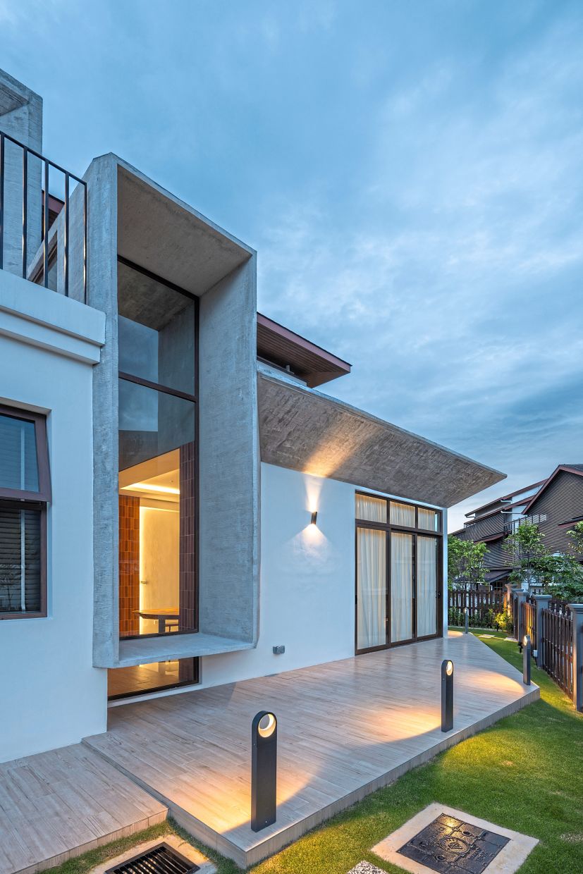 The layered rear facade balances bold geometry and soft illumination.