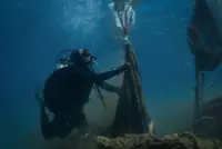 Greek divers haul up ghost nets destroying marine life