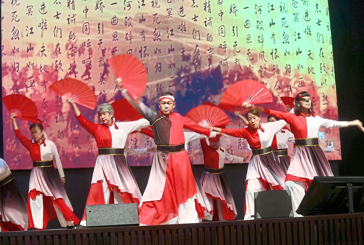 An exuberant dance (above) and cheeky lion (below) were part of the entertainment at the event.