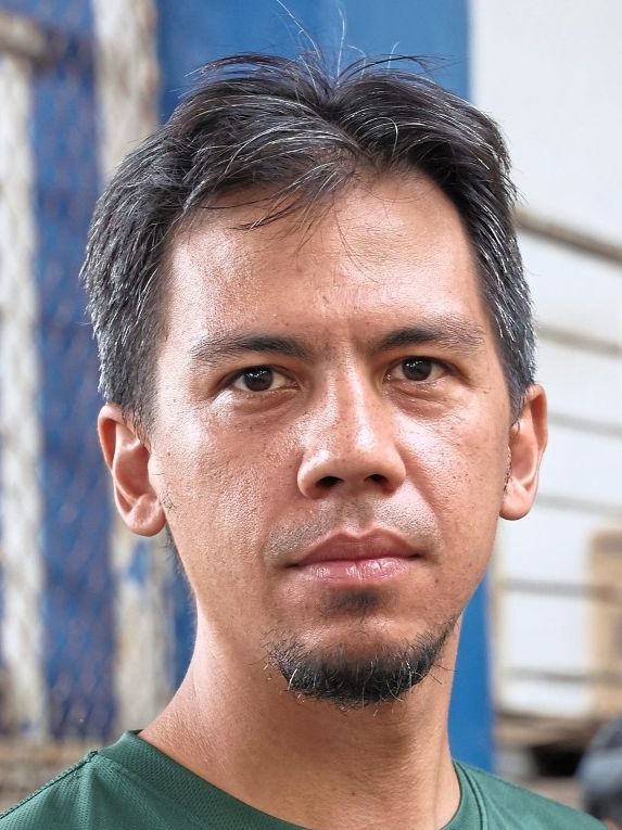 Patrick says a motorcyclist skirted close to his bicycle and jeered at him on the bike lane.