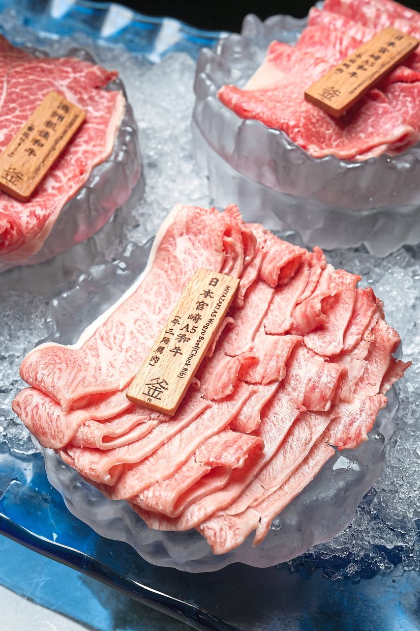 The wagyu beef platter allows diners to sample premium wagyu in a hotpot setting. — Fu Pot