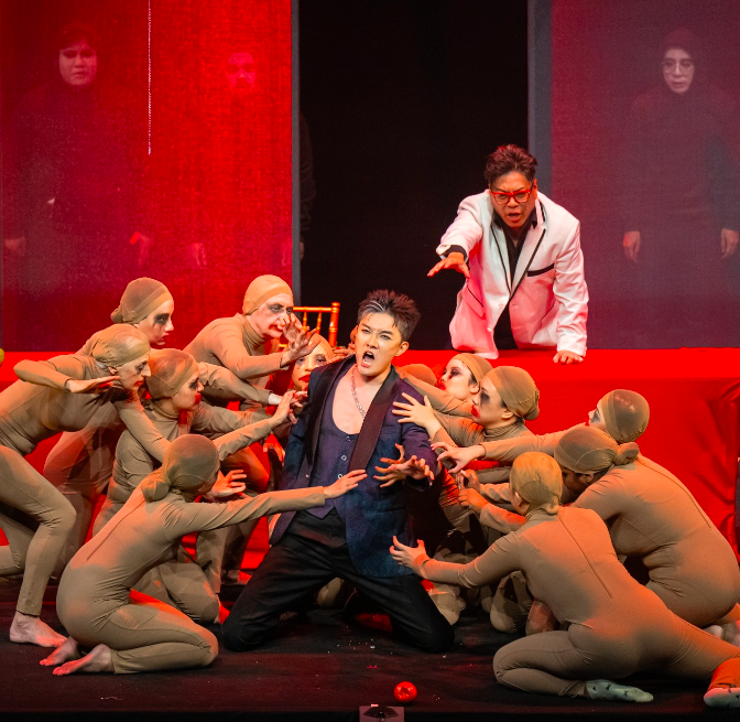 The 'Don Giovanni' cast at KLPac features Cao Yixiao (in black) as Don Giovanni, Chi Hoe Mak (in white) as Leporello. Photo: KL City Opera