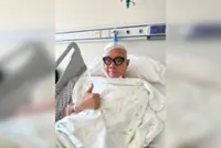 Singapore music producer Lee Si Song recovering from a sudden cerebral haemorrhage in Beijing