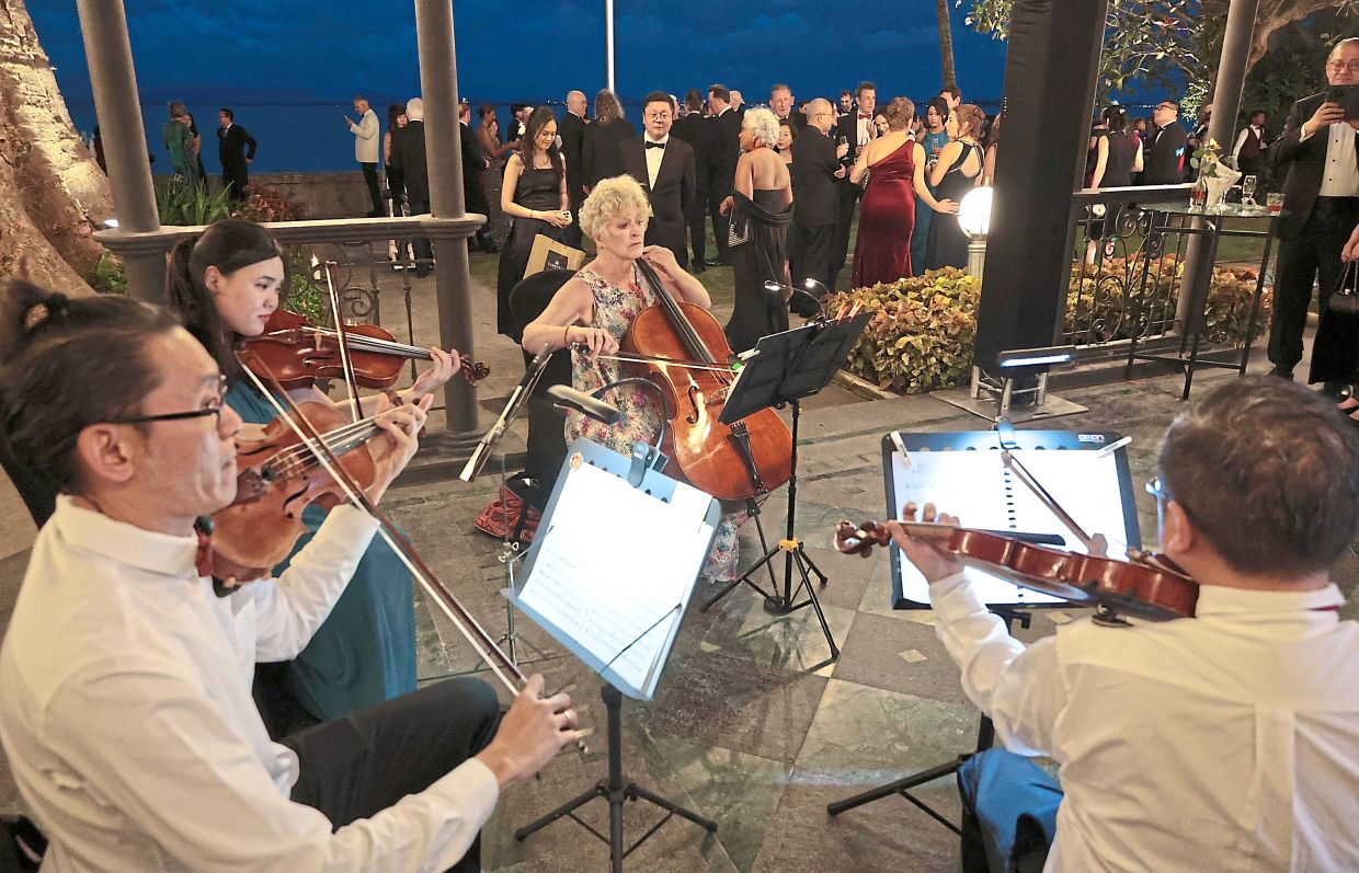 Musica Sinfonietta entertaining guests with classical pieces.