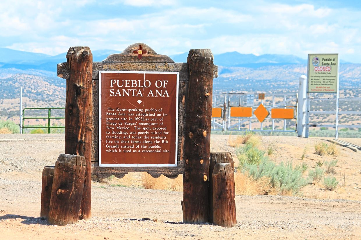 A historic marker provides details about the ceremonial village near Santa Ana Pueblo. -AP