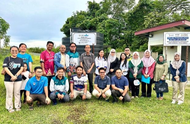 (Standing centre) Prof Rosalam together with the team of researchers at the site.