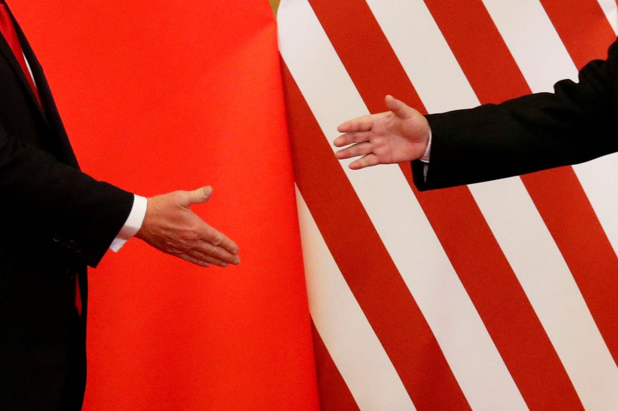 US, China hold tariff talks in Kuala Lumpur