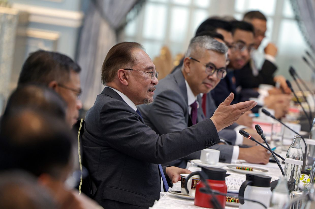 Prime Minister Datuk Seri Anwar Ibrahim speaks during a bilateral meeting with South African President Matamela Cyril Ramaphosa in conjunction with his official visit to Malaysia at the Seri Perdana Complex on Saturday (Oct 25). This marks Ramaphosa’s first official visit to Malaysia since assuming office in February 2018, as he attends the 47th Asean Summit and Related Summits as the Guest of the Chair. -- Photo: Bernama