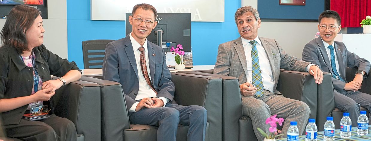 Cultural diplomacy: (From left) HWUM deputy provost Prof Lai Yin Ling sharing a light moment with Zhao, Prof Mushtak and Tang during the event.