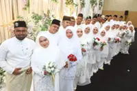 Lovebirds tie the knot in mass solemnisation