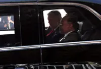 Trump, Anwar arrive at KL Convention Centre in 'The Beast'