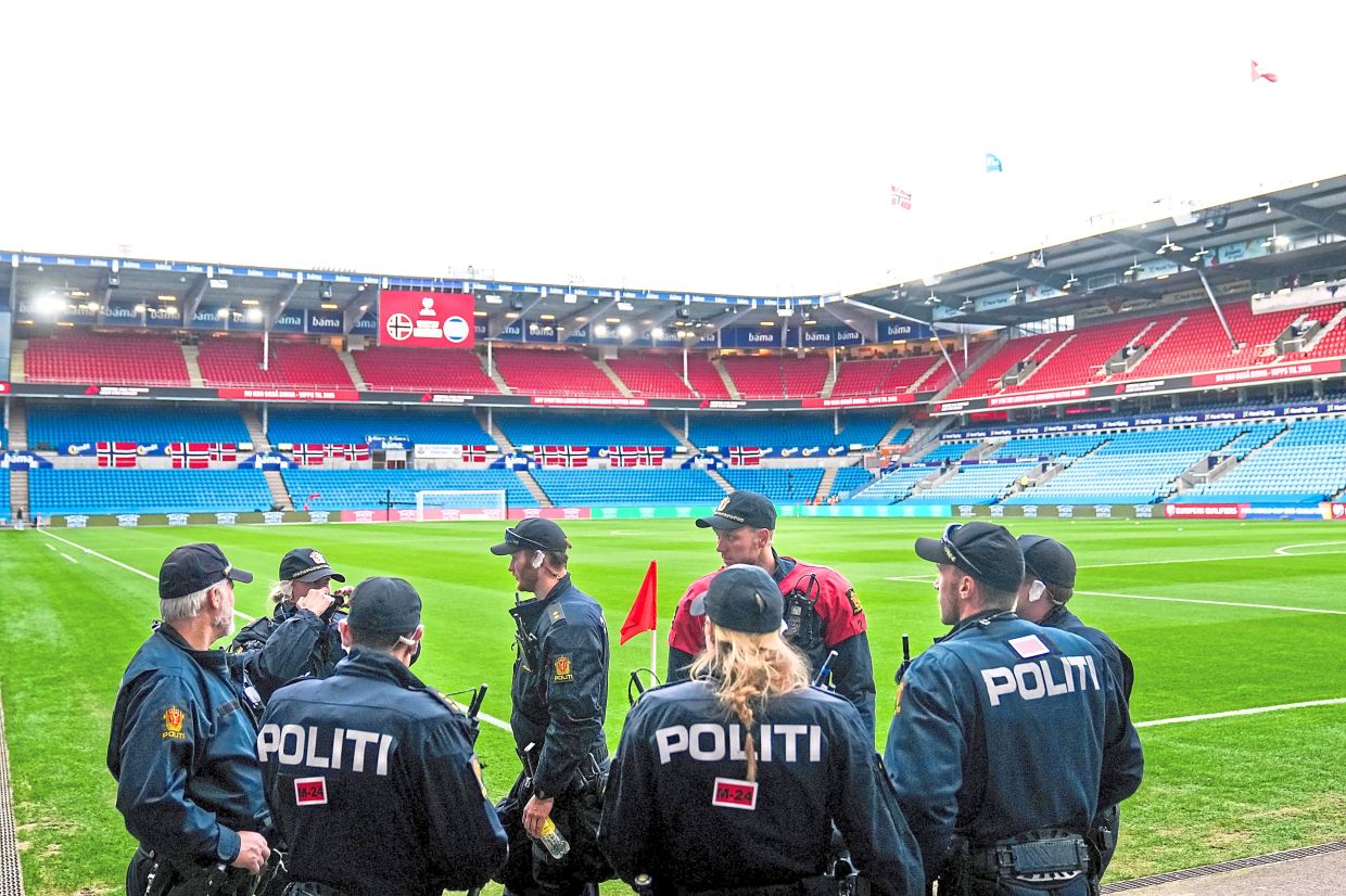 Police inside the stadium before the match. - Reuters