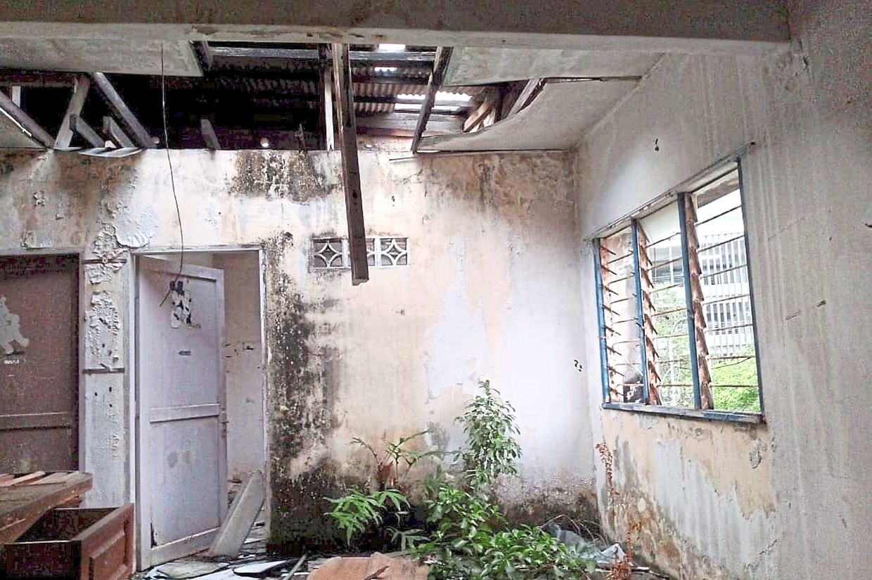 An abandoned unit at Block A of the Jalan Sepadu flats lies in ruins, a stark reminder of years without proper maintenance.