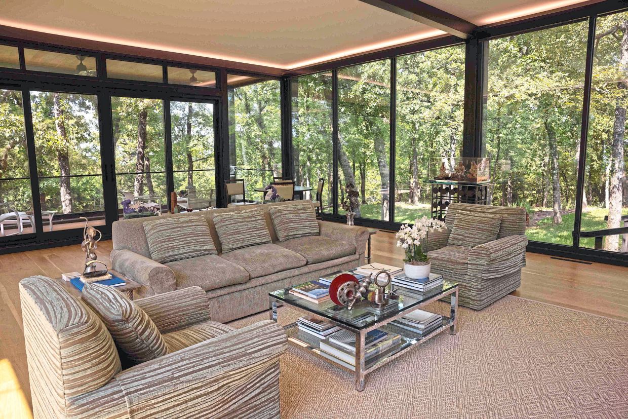 The interior features floors of white oak (recycled from Kansas) with internal walls of black walnut from Oklahoma.