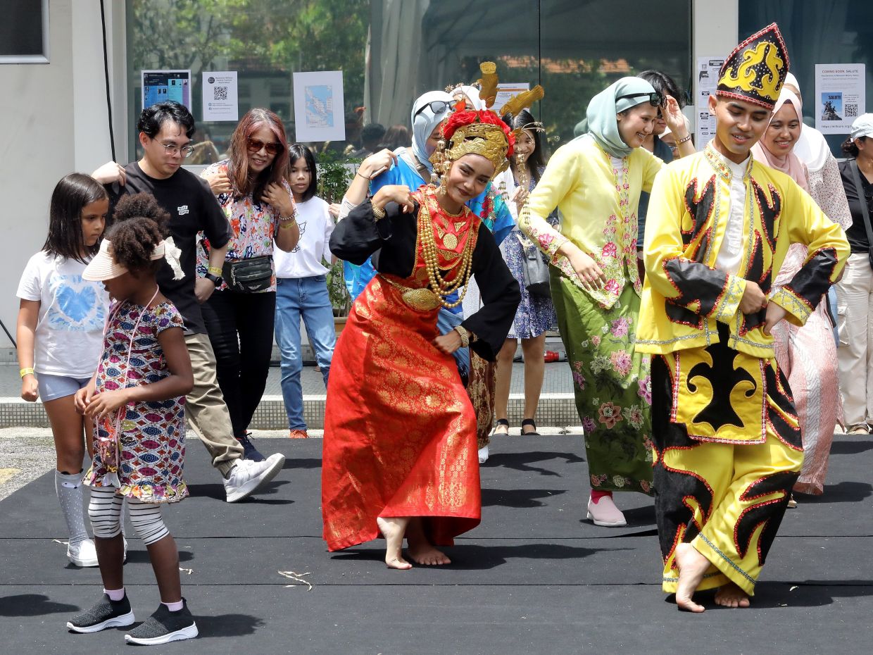 At Peszta, when there’s a street party, everyone’s invited to join in. Photo: The Star/Azlina Abdullah